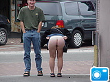 Oops, courageous wife taking off her pants in the street